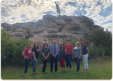 Capps Middle School staff members pose outside together