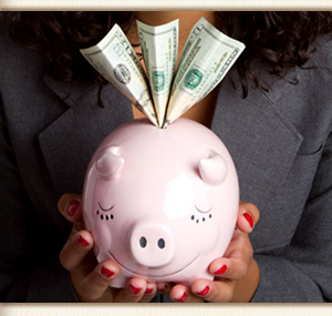 Woman holding a piggy bank